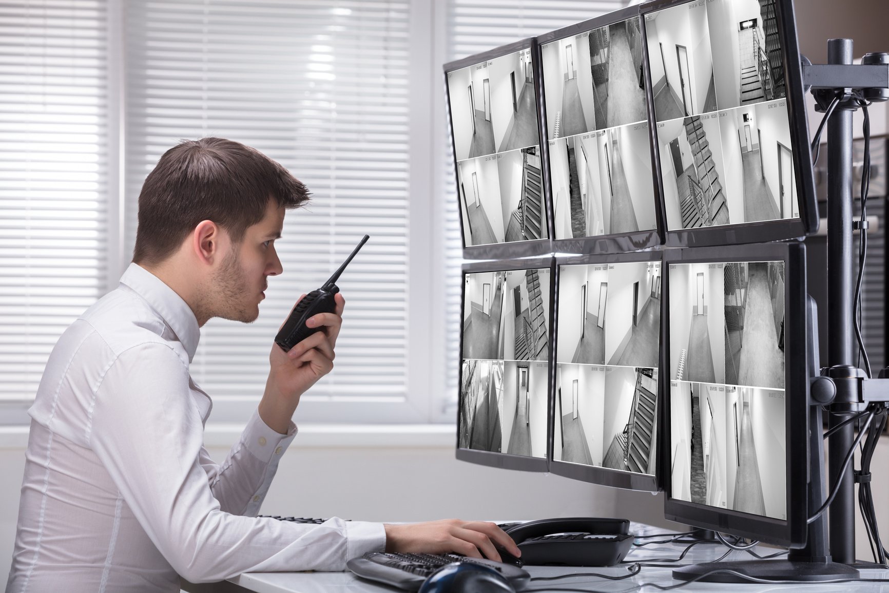 Security Guard Monitoring CCTV Footage